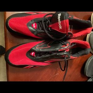 Reebock red football cleat